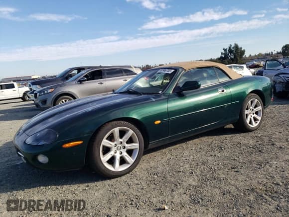 ✅ 2003 Jaguar XK • VIN: SAJDA42C232A31860 • Lot: 88586705. Wystawiony na Copart z przebiegiem 148 846 mil. Bezpłatny archiwum sprzedaży aukcyjnych z USA i szczegółowy raport historii pojazdu na DreamBid. Zdjęcie 1.