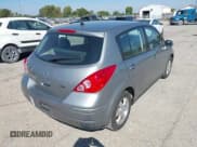 ✅ 2012 Nissan Versa S • VIN: 3N1BC1CP9CK801573 • Lot: 43251441. Listed on IAAI with 136,411 mi. Free auction sales archive from the USA and detailed vehicle history report at DreamBid. Image 4.