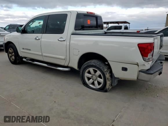✅ 2010 Nissan Titan LE • VIN: 1N6BA0ED4AN322935 • Lot: 89920375. Listed on Copart with 131,793 mi. Free auction sales archive from the USA and detailed vehicle history report at DreamBid. Image 2.