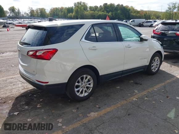 2020 Chevrolet Equinox LT z VIN 3GNAXJEV4LS727608, wystawiony jako IAAI lot #43434353 z przebiegiem 5 811 mil mil oraz . Historia ofert i sprzedaży dostępna na DreamBid. Obrazek 4.