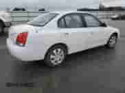2003 Hyundai Elantra GLS z VIN KMHDN45D63U614016, wystawiony jako Copart lot #71178754 z przebiegiem 153 226 mil mil oraz Nie do naprawy • Non repairable. Historia ofert i sprzedaży dostępna na DreamBid. Obrazek 3.