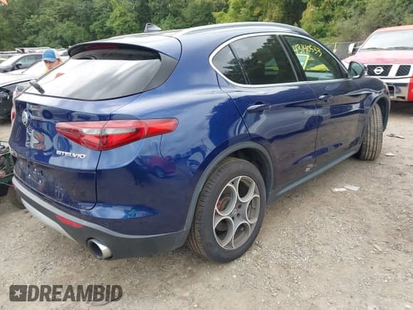 ✅ 2018 Alfa Romeo Stelvio Ti • VIN: ZASFAKBN8J7B78038 • Lot: 43140553. Wystawiony na IAAI z przebiegiem 100 962 mil. Bezpłatny archiwum sprzedaży aukcyjnych z USA i szczegółowy raport historii pojazdu na DreamBid. Zdjęcie 4.