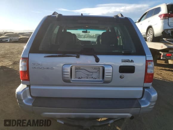 ✅ 2003 Isuzu Rodeo • VIN: 4S2DM58W734305363 • Lot: 85539774. Listed on Copart with 219,300 mi. Free auction sales archive from the USA and detailed vehicle history report at DreamBid. Image 6.