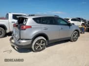 ✅ 2018 Toyota RAV4 XLE • VIN: 2T3WFREV5JW467588 • Lot: 86330945. Listed on Copart with 103,506 mi. Free auction sales archive from the USA and detailed vehicle history report at DreamBid. Image 3.