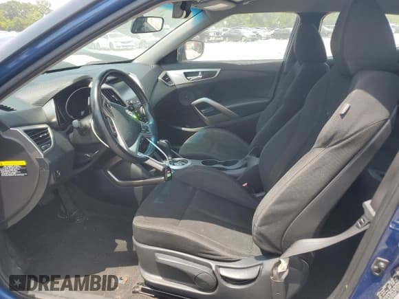 ✅ 2017 Hyundai Veloster • VIN: KMHTC6AD1HU307959 • Lot: 65978804. Wystawiony na Copart z przebiegiem 154 376 mil. Bezpłatny archiwum sprzedaży aukcyjnych z USA i szczegółowy raport historii pojazdu na DreamBid. Zdjęcie 7.