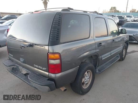 ✅ 2002 Chevrolet Tahoe LS • VIN: 1GNEC13T32R296694 • Lot: 43889754. Listed on IAAI with 170,172 mi. Free auction sales archive from the USA and detailed vehicle history report at DreamBid. Image 4.