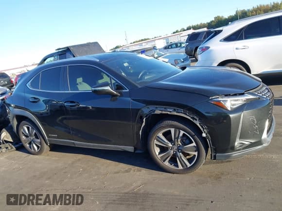 ✅ 2021 Lexus UX 250h • VIN: JTHP9JBH3M2051367 • Lot: 43462868. Wystawiony na IAAI z przebiegiem 99 472 mil. Bezpłatny archiwum sprzedaży aukcyjnych z USA i szczegółowy raport historii pojazdu na DreamBid. Zdjęcie 13.