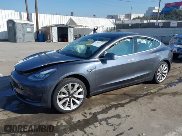 ✅ 2020 Tesla Model 3 Standard Range Plus • VIN: 5YJ3E1EA9LF662591 • Lot: 43642335. Listed on IAAI with 25,888 mi. Free auction sales archive from the USA and detailed vehicle history report at DreamBid. Image 2.