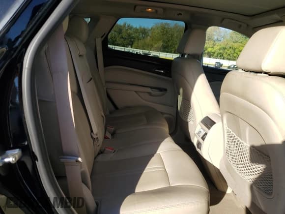 ✅ 2012 Cadillac SRX Performance Collection • VIN: 3GYFNBE33CS646165 • Lot: 90860355. Wystawiony na Copart z przebiegiem 157 539 mil. Bezpłatny archiwum sprzedaży aukcyjnych z USA i szczegółowy raport historii pojazdu na DreamBid. Zdjęcie 11.