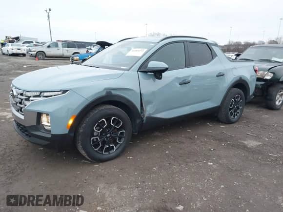 2023 Hyundai Santa Cruz SEL z VIN 5NTJCDAE7PH071384, wystawiony jako IAAI lot #41284372 z przebiegiem 29 160 mil mil oraz . Historia ofert i sprzedaży dostępna na DreamBid. Obrazek 17.