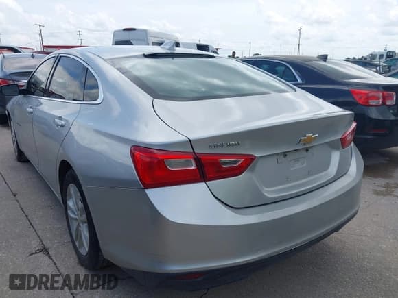 ✅ 2018 Chevrolet Malibu LT • VIN: 1G1ZD5ST0JF143540 • Lot: 42737601. Listed on IAAI with 142,193 mi. Free auction sales archive from the USA and detailed vehicle history report at DreamBid. Image 3.