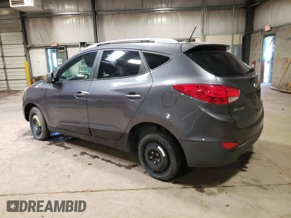 2015 Hyundai Tucson SE z VIN KM8JU3AG1FU973407, wystawiony jako Copart lot #59017604 z przebiegiem Nie podano mil oraz Szkoda całkowita • Salvage title. Historia ofert i sprzedaży dostępna na DreamBid. Obrazek 2.
