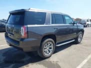 ✅ 2018 GMC Yukon SLE • VIN: 1GKS1AKC4JR163268 • Lot: 42604439. Listed on IAAI with 130,531 mi. Free auction sales archive from the USA and detailed vehicle history report at DreamBid. Image 4.