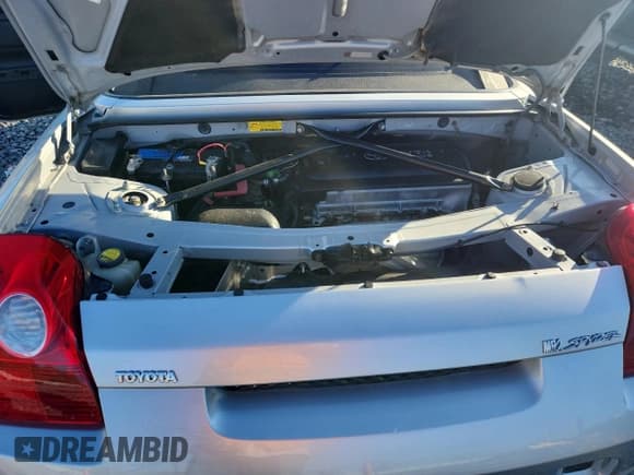 ✅ 2003 Toyota MR2 • VIN: JTDFR320130056726 • Лот: 90037165. Опубликован ранее на Copart с пробегом 102 753 миль. Бесплатный доступ к архиву аукционных продаж из США и подробный отчёт об истории автомобиля на DreamBid. Изображение 11.