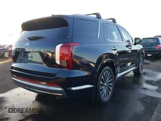 2023 Hyundai Palisade Calligraphy z VIN KM8R74GE6PU537689, wystawiony jako IAAI lot #41151656 z przebiegiem 23 392 mil mil oraz . Historia ofert i sprzedaży dostępna na DreamBid. Obrazek 4.