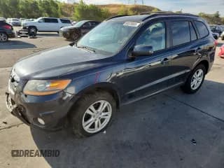 ✅ 2011 Hyundai Santa Fe SE • VIN: 5XYZHDAG9BG013829 • Lot: 80079905. Listed on Copart with 185,702 mi. Free auction sales archive from the USA and detailed vehicle history report at DreamBid. Image 1.