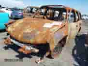 2005 Chevrolet Tahoe LT with VIN 1GNEC13T35R103223, listed as a IAAI auction lot 42165644 with Not provided miles and . Bid and sale history available at DreamBid. Image 2.