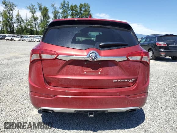✅ 2020 Buick Envision Premium II • VIN: LRBFX4SX5LD103627 • Лот: 64050825. Опубликован ранее на Copart с пробегом 59 760 миль. Бесплатный доступ к архиву аукционных продаж из США и подробный отчёт об истории автомобиля на DreamBid. Изображение 6.
