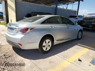 ✅ 2012 Hyundai Sonata Hybrid • VIN: KMHEC4A42CA030620 • Lot: 69455464. Listed on Copart with 94,257 mi. Free auction sales archive from the USA and detailed vehicle history report at DreamBid. Image 3.