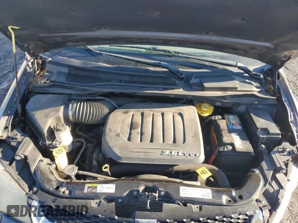 ✅ 2015 Dodge Grand Caravan SXT • VIN: 2C4RDGCG6FR671023 • Lot: 90363565. Wystawiony na Copart z przebiegiem 146 815 mil. Bezpłatny archiwum sprzedaży aukcyjnych z USA i szczegółowy raport historii pojazdu na DreamBid. Zdjęcie 12.