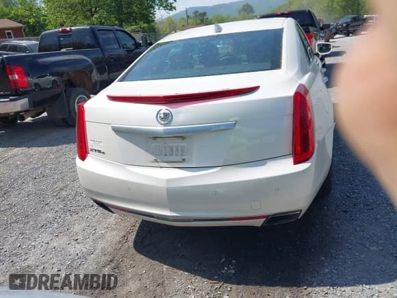 ✅ 2015 Cadillac XTS Luxury • VIN: 2G61N5S33F9172115 • Лот: 42148122. Опубликован ранее на IAAI с пробегом 100 924 миль. Бесплатный доступ к архиву аукционных продаж из США и подробный отчёт об истории автомобиля на DreamBid. Изображение 17.