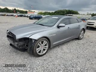 ✅ 2014 Jaguar XJ Portfolio • VIN: SAJWA2GZ3E8V61469 • Lot: 60643325. Listed on Copart with 127,151 mi. Free auction sales archive from the USA and detailed vehicle history report at DreamBid. Image 1.