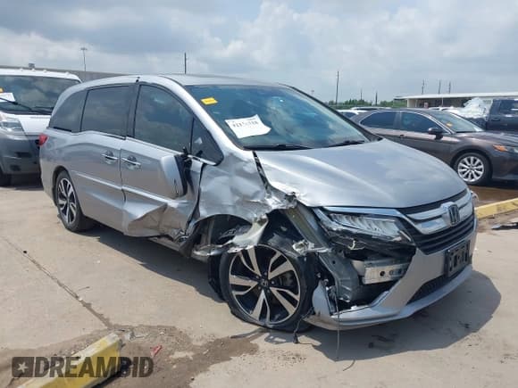 ✅ 2018 Honda Odyssey Elite • VIN: 5FNRL6H98JB062513 • Lot: 42126318. Listed on IAAI with 75,589 mi. Free auction sales archive from the USA and detailed vehicle history report at DreamBid. Image 1.