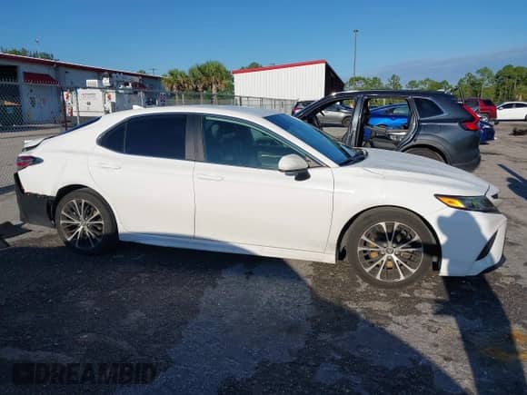 2019 Toyota Camry LE with VIN 4T1B11HKXKU794532, listed as a IAAI auction lot 43224157 with 80,828 mi miles and . Bid and sale history available at DreamBid. Image 13.