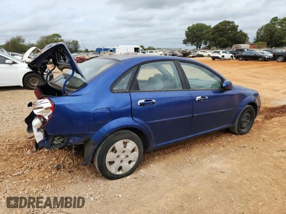 ✅ 2006 Suzuki Forenza • VIN: KL5JD56Z06K334060 • Lot: 85164135. Listed on Copart with 135,880 mi. Free auction sales archive from the USA and detailed vehicle history report at DreamBid. Image 3.
