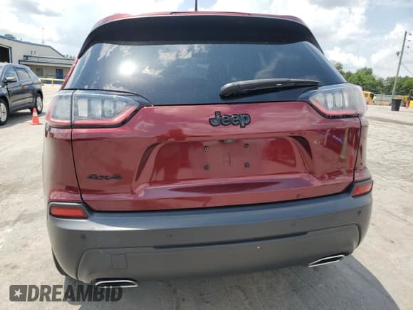 ✅ 2020 Jeep Cherokee Altitude • VIN: 1C4PJMLX0LD502404 • Lot: 63835115. Wystawiony na Copart z przebiegiem 127 334 mil. Bezpłatny archiwum sprzedaży aukcyjnych z USA i szczegółowy raport historii pojazdu na DreamBid. Zdjęcie 6.