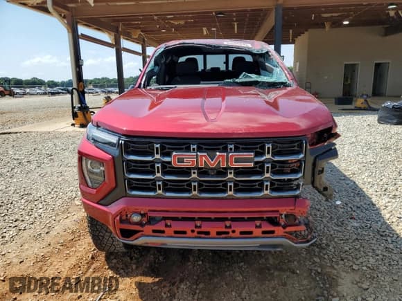 ✅ 2024 GMC Canyon 4WD AT4 • VIN: 1GTP6DEKXR1295002 • Lot: 65956045. Listed on Copart with 7,384 mi. Free auction sales archive from the USA and detailed vehicle history report at DreamBid. Image 5.