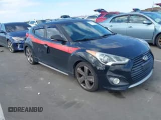 ✅ 2014 Hyundai Veloster Turbo • VIN: KMHTC6AE3EU183231 • Lot: 43641241. Listed on IAAI with 154,712 mi. Free auction sales archive from the USA and detailed vehicle history report at DreamBid. Image 1.
