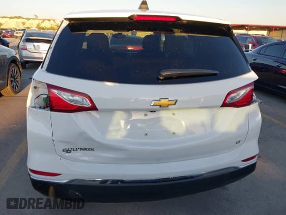 ✅ 2019 Chevrolet Equinox LT • VIN: 2GNAXKEV3K6138147 • Lot: 43639906. Listed on IAAI with 124,421 mi. Free auction sales archive from the USA and detailed vehicle history report at DreamBid. Image 18.