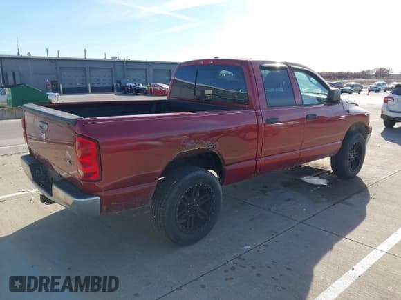 ✅ 2007 Dodge 1500 SLT • VIN: 1D7HU18267S220752 • Lot: 43642209. Listed on IAAI with 206,579 mi. Free auction sales archive from the USA and detailed vehicle history report at DreamBid. Image 4.