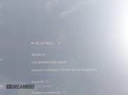 ✅ 2025 Tesla Model Y Long Range • VIN: 7SAYGDED5SF248415 • Лот: 43464829. Опубликован ранее на IAAI с пробегом 18 306 миль. Бесплатный доступ к архиву аукционных продаж из США и подробный отчёт об истории автомобиля на DreamBid. Изображение 7.