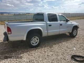 2002 Dodge Dakota Sport z VIN 1B7HG38N02S691280, wystawiony jako Copart lot #66309924 z przebiegiem 227 327 mil mil oraz Czysty tytuł • Clean title. Historia ofert i sprzedaży dostępna na DreamBid. Obrazek 3.