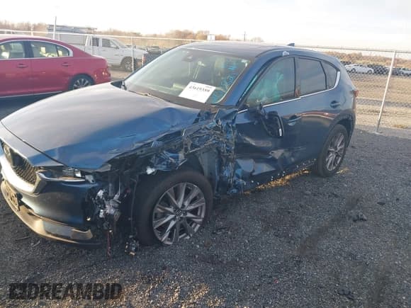 ✅ 2019 Mazda CX-5 Grand Touring Reserve • VIN: JM3KFBDYXK0568219 • Lot: 43619359. Listed on IAAI with 65,252 mi. Free auction sales archive from the USA and detailed vehicle history report at DreamBid. Image 18.