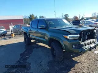 ✅ 2021 Toyota Tacoma SR • VIN: 3TMCZ5AN7MM440553 • Lot: 43609596. Listed on IAAI with 61,689 mi. Free auction sales archive from the USA and detailed vehicle history report at DreamBid. Image 1.