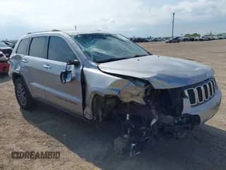 2021 Jeep Grand Cherokee 80th Anniversary with VIN 1C4RJEBG8MC656527, listed as a IAAI auction lot 43105741 with 67,310 mi miles and . Bid and sale history available at DreamBid. Image 1.