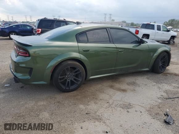 ✅ 2022 Dodge Charger SRT Hellcat Widebody • VIN: 2C3CDXL94NH107922 • Лот: 68750585. Опубликован ранее на Copart с пробегом 21 379 миль. Бесплатный доступ к архиву аукционных продаж из США и подробный отчёт об истории автомобиля на DreamBid. Изображение 3.