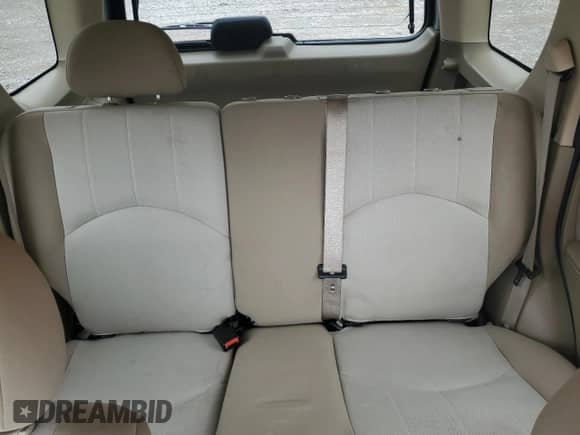 2006 Mercury Mariner Luxury z VIN 4M2CU56196KJ17209, wystawiony jako Copart lot #58450665 z przebiegiem 239 728 mil mil oraz Szkoda całkowita • Salvage title. Historia ofert i sprzedaży dostępna na DreamBid. Obrazek 10.