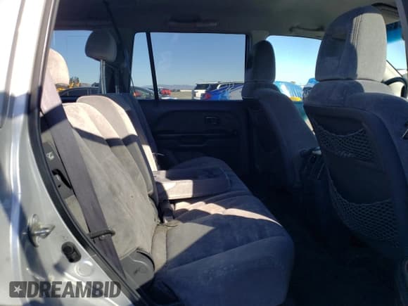 ✅ 2004 Honda Pilot EX • VIN: 2HKYF18454H596830 • Lot: 82773465. Listed on Copart with 217,498 mi. Free auction sales archive from the USA and detailed vehicle history report at DreamBid. Image 11.