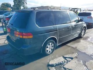 ✅ 2003 Honda Odyssey EX-L • VIN: 5FNRL18913B026944 • Lot: 43750155. Wystawiony na IAAI z przebiegiem 265 155 mil. Bezpłatny archiwum sprzedaży aukcyjnych z USA i szczegółowy raport historii pojazdu na DreamBid. Zdjęcie 4.