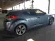 2015 Hyundai Veloster z VIN KMHTC6AD1FU232550, wystawiony jako Copart lot #69808314 z przebiegiem 97 915 mil mil oraz Szkoda całkowita • Salvage title. Historia ofert i sprzedaży dostępna na DreamBid. Obrazek 3.
