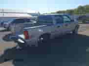 2005 Chevrolet Silverado 1500 LS with VIN 2GCEK13T051373854, listed as a IAAI auction lot 43394594 with 266,686 mi miles and . Bid and sale history available at DreamBid. Image 4.