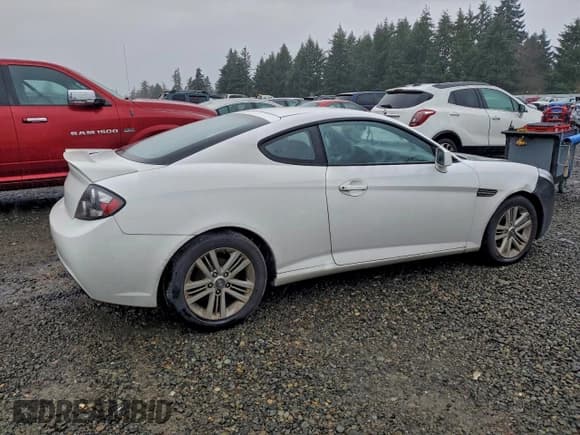 ✅ 2008 Hyundai Tiburon GS • VIN: KMHHM66DX8U290039 • Лот: 95370315. Опубликован ранее на Copart с пробегом 130 680 миль. Бесплатный доступ к архиву аукционных продаж из США и подробный отчёт об истории автомобиля на DreamBid. Изображение 3.