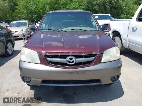 ✅ 2001 Mazda Tribute LX • VIN: 4F2YU081X1KM40012 • Lot: 42569557. Listed on IAAI with 228,754 mi. Free auction sales archive from the USA and detailed vehicle history report at DreamBid. Image 6.
