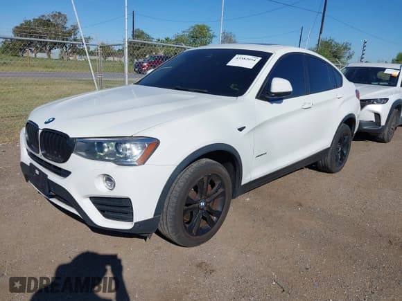 ✅ 2016 BMW X4 xDrive28i • VIN: 5UXXW3C52G0R20209 • Lot: 43582054. Listed on IAAI with 122,015 mi. Free auction sales archive from the USA and detailed vehicle history report at DreamBid. Image 17.
