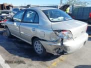 ✅ 2002 Kia Rio • VIN: KNADC123X26183989 • Лот: 41837792. Опубликован ранее на IAAI с пробегом 116 746 миль. Бесплатный доступ к архиву аукционных продаж из США и подробный отчёт об истории автомобиля на DreamBid. Изображение 3.