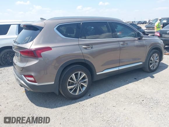 ✅ 2020 Hyundai Santa Fe SEL • VIN: 5NMS33AD3LH261307 • Lot: 42940601. Listed on IAAI with 95,444 mi. Free auction sales archive from the USA and detailed vehicle history report at DreamBid. Image 4.